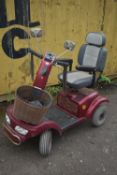 A SHOPRIDER SPRINTER ELECTRIC MOBILITY SCOOTER (condition report: no key and untested, with power