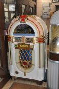 A DEUTSCHE WURLITZER ELVIS JUKEBOX with Certificate of Authenticity numbered 0729 width 85cm depth