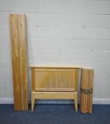 A MODERN BEECH SINGLE BEDSTEAD, with side rails, slats and screws (condition report: some