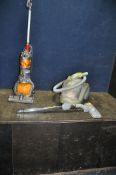 A DYSON DC24 ALL FLOORS UPRIGHT VACUUM CLEANER (brush bar not turning) and a Dyson DC02 vacuum