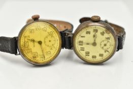 TWO EARLY 20TH CENTURY SILVER WRISTWATCHES, the first a manual wind watch, round white dial