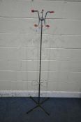 A MID CENTURY COAT / HAT STAND/ with six arms and two umbrella / stick holders, height 160cm (