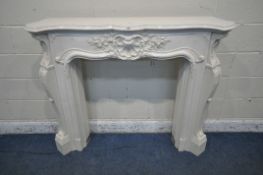 AN ITALIAN MARBLE EFFECT RESIN FIRE SURROUND, with foliate details, width 139cm x depth 27cm x