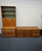 G PLAN, A MID CENTURY TEAK WALL CABINET, with two adjustable shelves, above a fall front door,