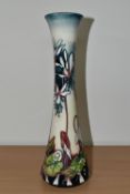 A MOORCROFT POTTERY 'MINUET' PATTERN VASE, of elongated form, tube lined with pink and white