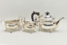A GEORGE V SILVER THREE PIECE TEA SET, of a faceted design, comprising of a teapot fitted with an