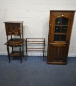 AN EARLY 20TH CENTURY OAK CORNER CUPBOARD, with a glazed door and cupboard door, an oak double