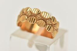 A 1970S 18CT YELLOW GOLD DRESS RING, the two-row abstract design ring with grooved detail,