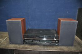 A MID CENTURY HITACHI SDT-7680 MUSIC CENTRE with rosewood effect vinyl covering, smoked Plexi