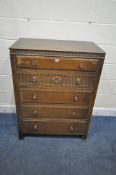 AN EARLY 20TH CENTURY OAK CHEST OF FIVE DRAWERS, width 83cm x depth 50cm x height 112cm (condition