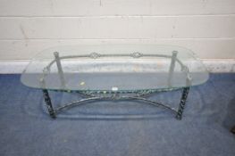 A TUBULAR METAL COFFEE TABLE, with a bevelled glass top, width 132cm x depth 67cm x height 42cm (