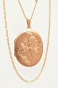 A 9CT GOLD OVAL LOCKET WITH CHAIN, floral pattern to one side of the oval locket, hallmarked 9ct