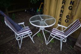 A MODERN METAL AND GLASS GARDEN TABLE, diameter 80cm x height 70cm, parasol and two folding
