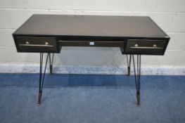 A MODERN METAL DESK, with three drawers, raised on hairpin legs, width 120cm x depth 55cm x height