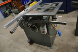 AN INDUSTRIAL TABLE SAW WITH 12in BLADE bed width 77cm depth 71cm height 91cm, with articulated arm,