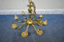 A BRASS EIGHT BRANCH CEILING LIGHT, approximate diameter 65cm x approximate drop 114cm (condition