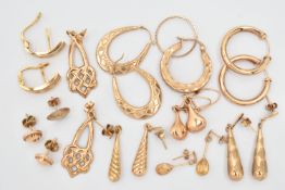 A SELECTION OF YELLOW METAL EARRINGS, to include one pair of earrings with star accent detail,