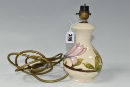 A MOORCROFT POTTERY MAGNOLIA TABLE LAMP BASE, tube lined in pink Magnolia pattern on a cream ground,