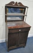 A REGENCY MAHOGANY CHIFFONIER, the raised back with twin swan neck pediment, two shelves and a