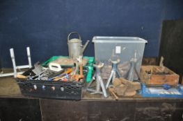 THREE TRAYS CONTAINING TOOLS including an untested Wickes tile cutter, three axle stands, a Record