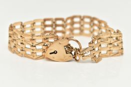 A 9CT GOLD GATE BRACELET, four bar gate bracelet, approximate width 14.9mm, scrolling and polished