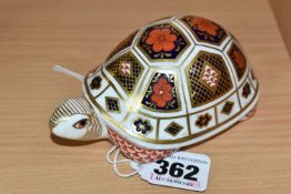 A ROYAL CROWN DERBY 'TURTLE' PAPERWEIGHT, printed with an Imari patterned shell, very light gold