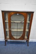 AN EDWARDIAN MAHOGANY AND MARQUETRY INLAID BREAKFRONT DISPLAY CABINET, the single astragal glazed