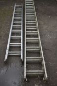 A SET OF CLIMA ALUMINIUM DOUBLE EXTENSION LADDERS with 14 rungs to each 375cm section, and a similar