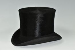 A TOP HAT, by Cater and Sons of 88, St James Street, London SW, internal measurements 19.5cm x 16cm,