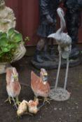 FOUR CAST IRON FIGURES, of two hens and two chicks, along with a galvanised figure of a stalk (