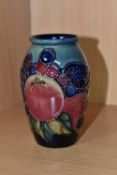 A MOORCROFT POTTERY 'FINCHES' PATTERN VASE, of small ovoid form, tube lined with a pair of purple