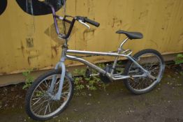 AN UNBRANDED BMX BIKE (some rusting and tyres flat)
