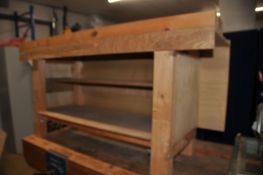 A PINE WORKBENCH WITH PLYWOOD TOP AND PANELS width 168cm depth 54cm height 85cm