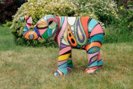 'Atlas' is a fun little fella with lots of colours and patterns painted all over his body in an