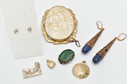 A SMALL BAG OF JEWELLERY, to include a large carved cameo brooch, in a gilt metal mount, fitted with