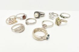 AN ASSORTMENT OF RINGS, to include a white gold and topaz ring, hallmarked 9ct Birmingham, ring size