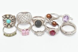 TEN SILVER AND WHITE METAL RINGS, to include a silver and hematite Centurian intaglio signet ring,