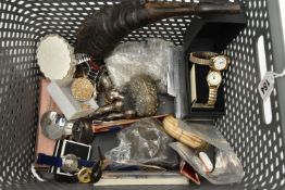 A BASKET TRAY OF ASSORTED ITEMS, to include a white metal dog figure, a pair of white metal cat