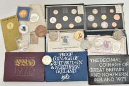 A NIKE BOX CONTAINING COINS COMMEMORATIVES, to include a George VI 1937 Proof Crown, a French 50mm