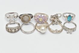 TEN WHITE METAL RINGS, an assortment of white metal dress rings, most set with cubic zirconia
