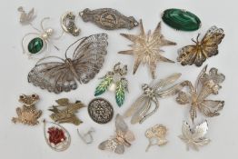 A SELECTION OF WHITE METAL JEWELLERY, to include cannetille butterfly and flower brooches, two