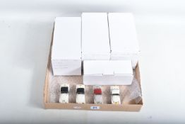 FOUR CONSTRUCTED K & R REPLICAS TRIUMPH TR3 SPORTS CAR MODEL KITS, all 1/43 white metal kits that