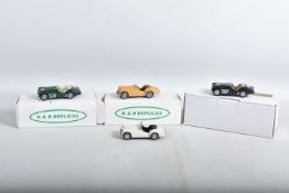 FOUR CONSTRUCTED K & R REPLICAS TRIUMPH TR2 SPORTS CAR MODEL KITS, all 1/43 white metal kits that