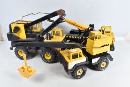 THREE UNBOXED PLAYWORN MIGHTY TONKA TOYS CONSTRUCTION VEHICLES, two are signed to the side 'Tonka
