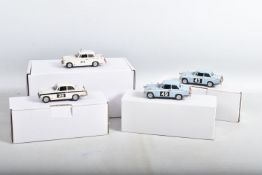 FOUR CONSTRUCTED K & R REPLICAS TRIUMPH SPORTS CAR MODEL KITS, all 1/43 white metal kits that have