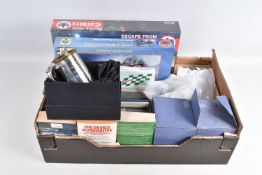 A TRAY CONTAINING A SELECTION OF MISCELLANEOUS BOARD GAMES AND BOOKS, to include a sealed Osprey
