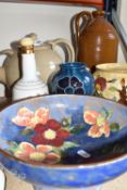 A GROUP OF NAMED CERAMICS AND STONEWARE, comprising a German stoneware flagon, impressed maker's