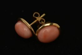 A PAIR OF ITALIAN CORAL EARRINGS, oval cabochon coral set in yellow metal, approximate length