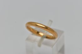 A BAND RING, of plain design, stamped 22ct, ring size N 1/2, approximate weight 4.2 grams (condition