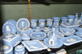 A COLLECTION OF WEDGWOOD PALE BLUE JASPERWARE, over fifty pieces to include vases, tallest 13cm,